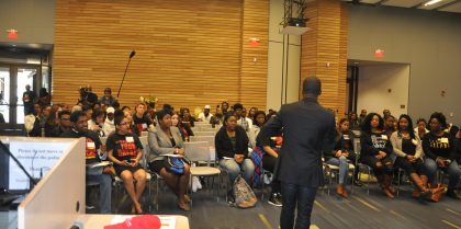 public speaker speaking to students