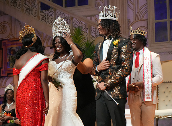 The new Mr. and Misses UDC being crowned.