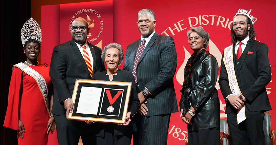 Virginia Ali accepts an award on Founders Day 2025