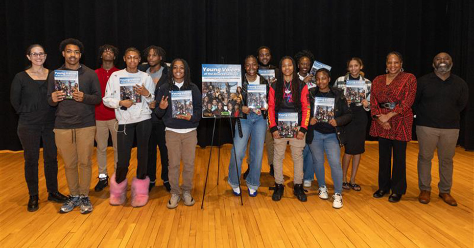 Anacostia High School Students holding their books