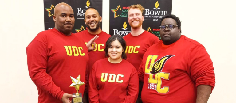 Coach Andreas Smith, Aimee Balthazar and Brian Simpkins. Back row: Jamil Mian and Bailey Garfield.