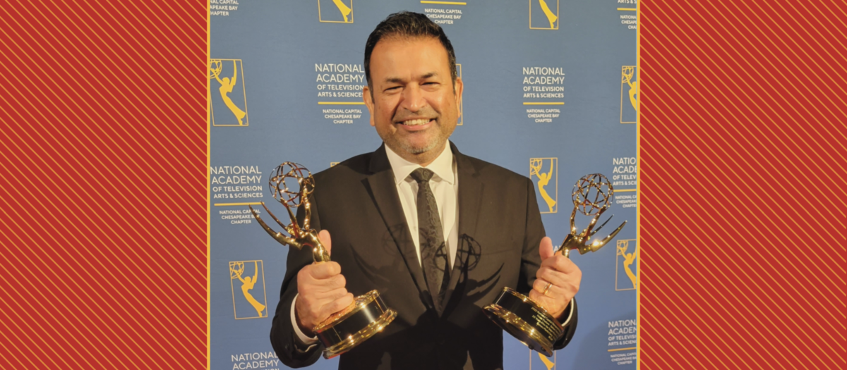 UDC Alumnus Larry Sindass holding his Emmy Awards