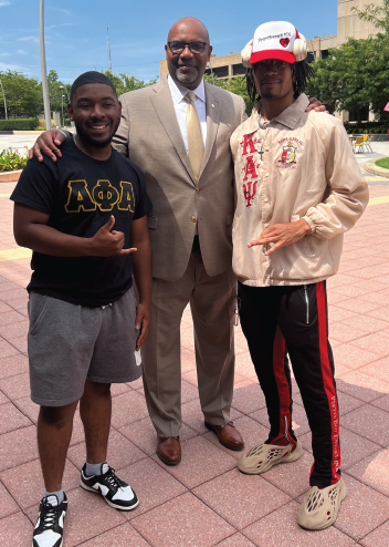 UDC President Maurice D. Edington, Ph.D., poses with USGA President Brent Thigpen (left) and 2023-2024 Mr. Homecoming Jaeron