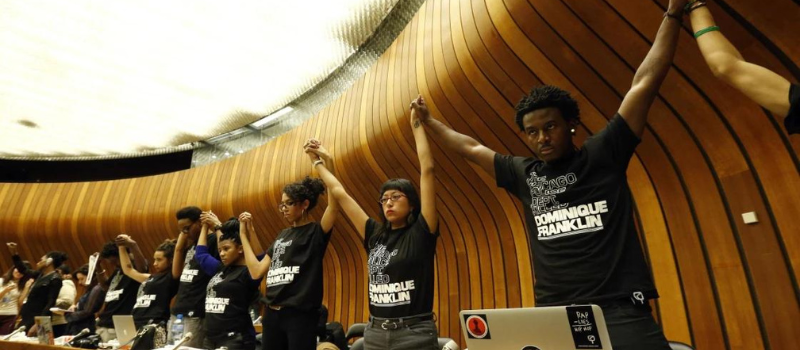 Breanna Champion protesting at the United Nations.