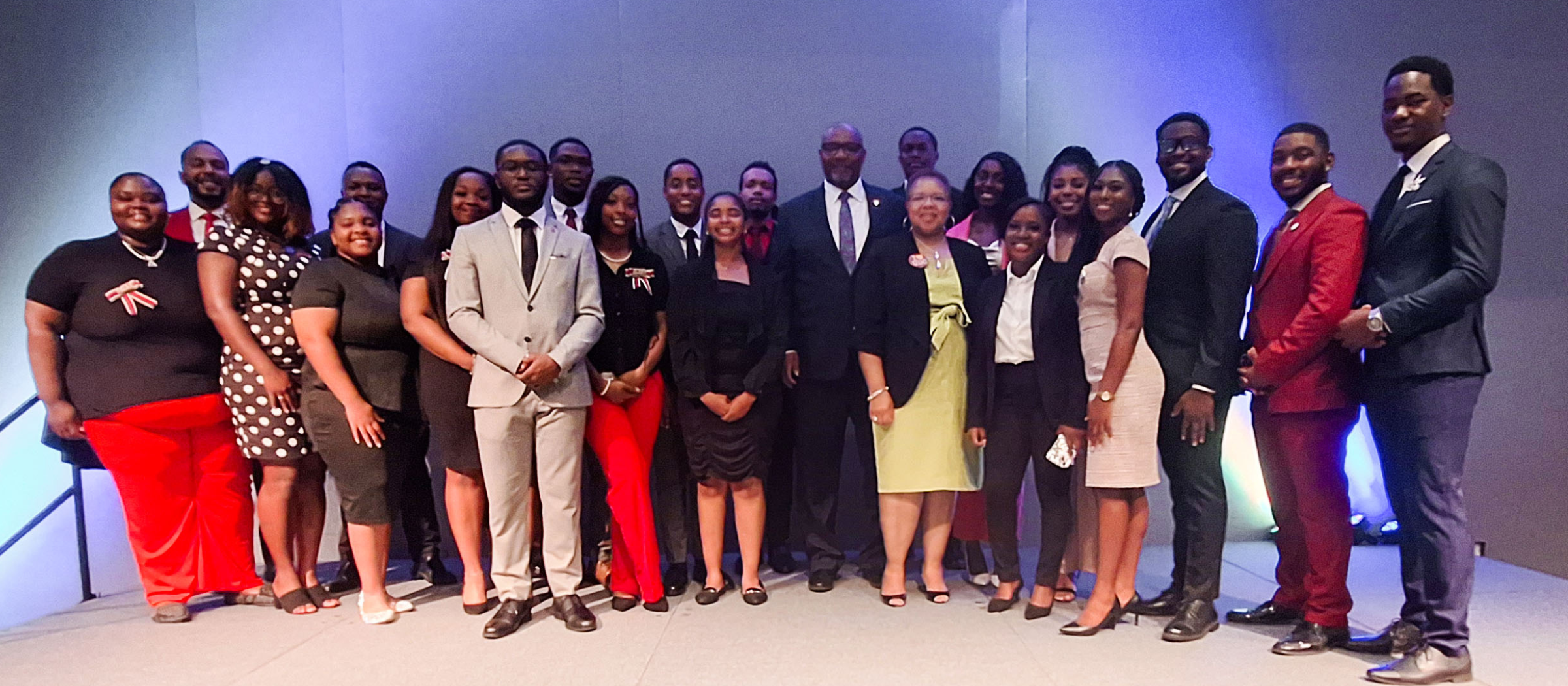 President Edington and First Lady Tonya Edington (center) pose with newly installed student leaders and members of the UDC Royal Court.