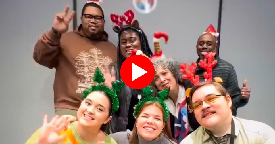 Play button leading to Happy Holidays messages from different departments at UDC.