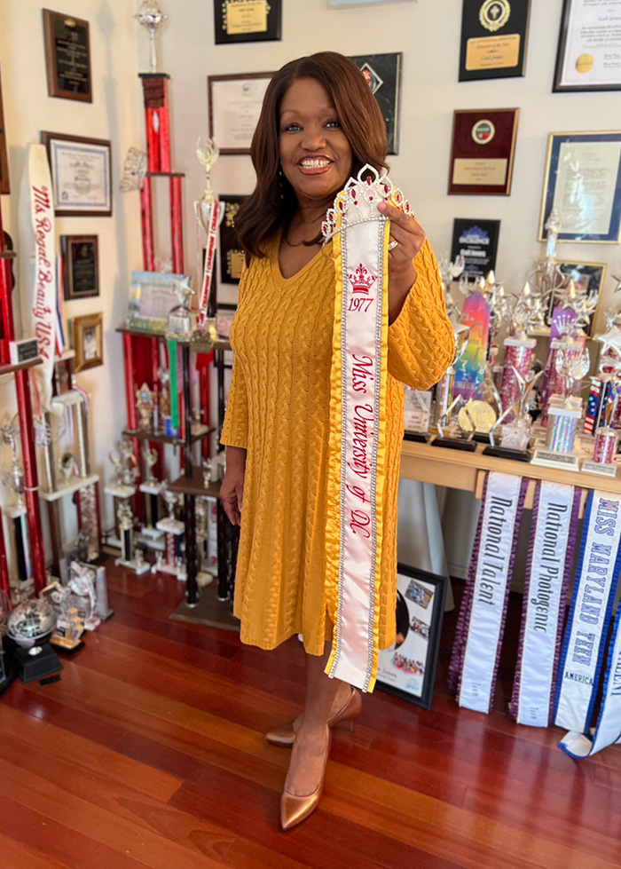 Jones holding her sash